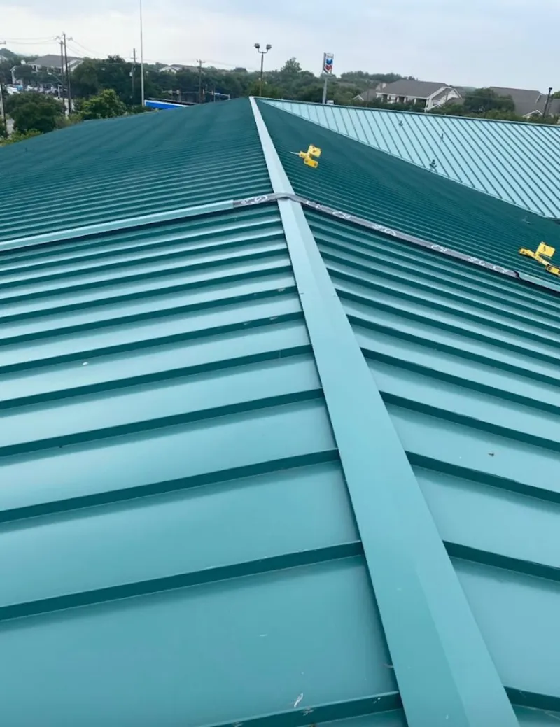 Green commercial metal roof ridge and valley for Metal Roof Repair in Miami Springs